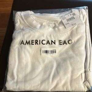 American eagle white tee with pocket with blue ae logo on back blue